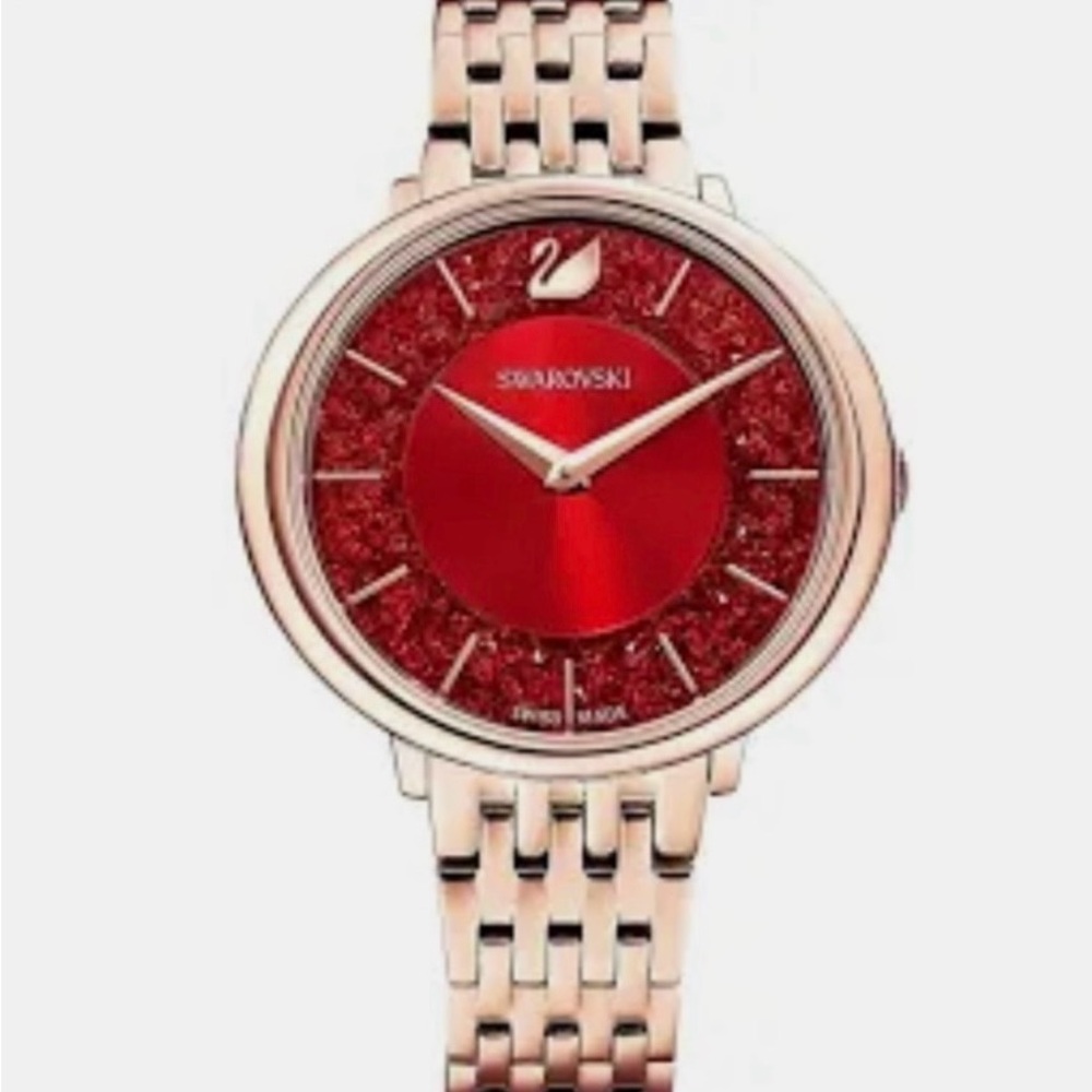 Brand new, never been used Swarovski watch. Red and rose gold.